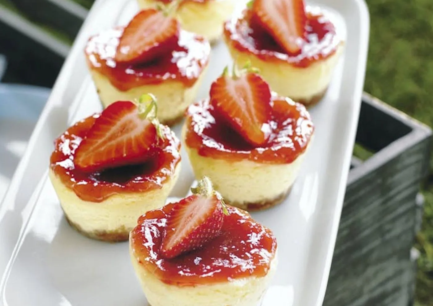 Baked Mini Cheesecakes with Strawberry Coulis