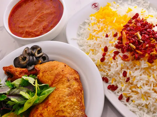 Pollo alle olive con cuscus allo zafferano