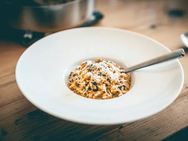 Risotto med champignon, soltørrede tomater og spinat