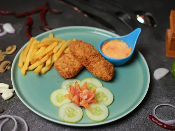 Nuggets di pollo croccanti al forno